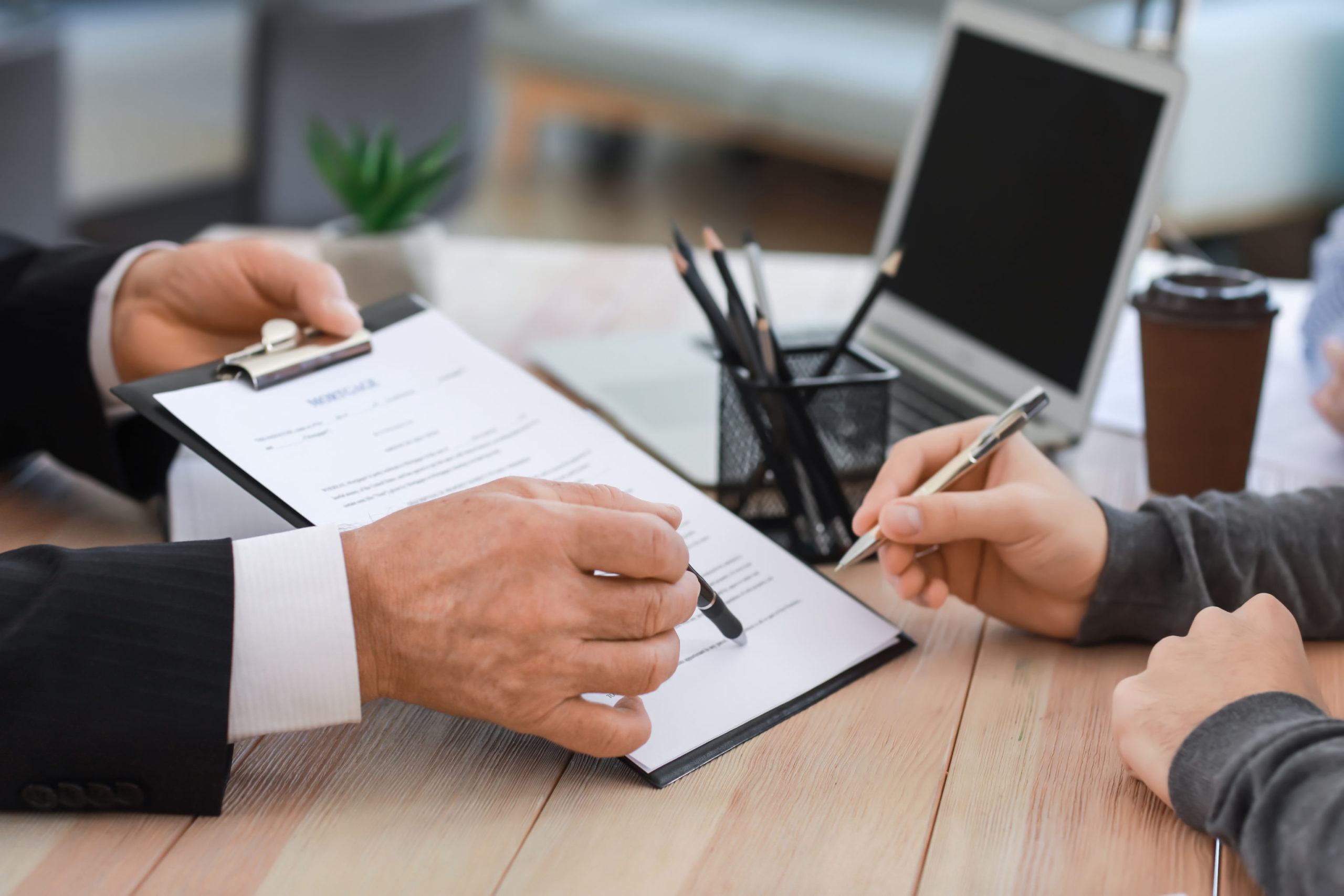 preparing to sign a document